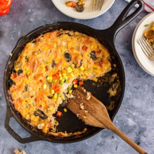 scalloped corn casserole in a skillet