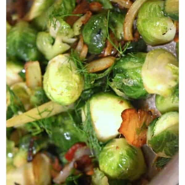A close up of food, with Fennel and Brussels sprout