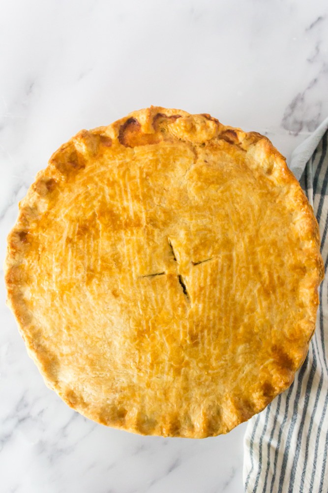 Overhead view of a baked homemade turkey pot pie.