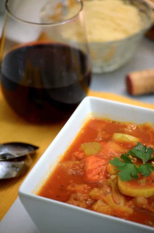 A bowl of food on a tray, with Soup 