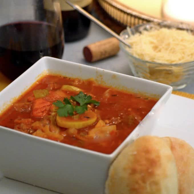 A close up of a tray of food, with Soup