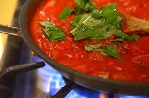 A pot with marinara sauce