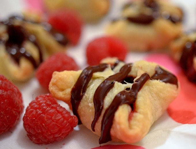 A close up of food, with Chocolate and Raspberry,