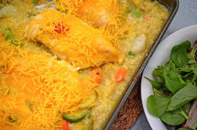 A dish is filled with Chicken and rice casserole.