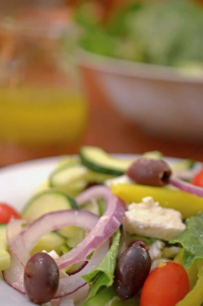 A close-up of a bowl Greek salad.