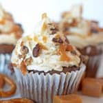 A close up of a chocolate caramel cupcake.