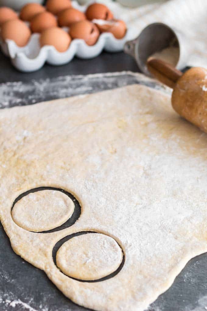 Cutting out pierogi dough.