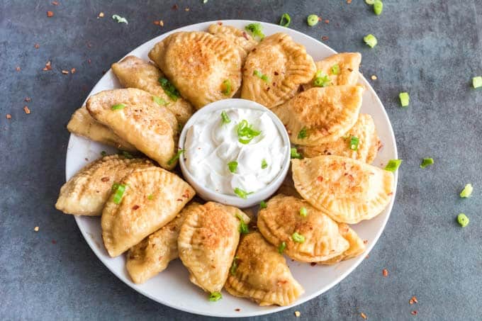 A plate of Pierogi and Sour cream