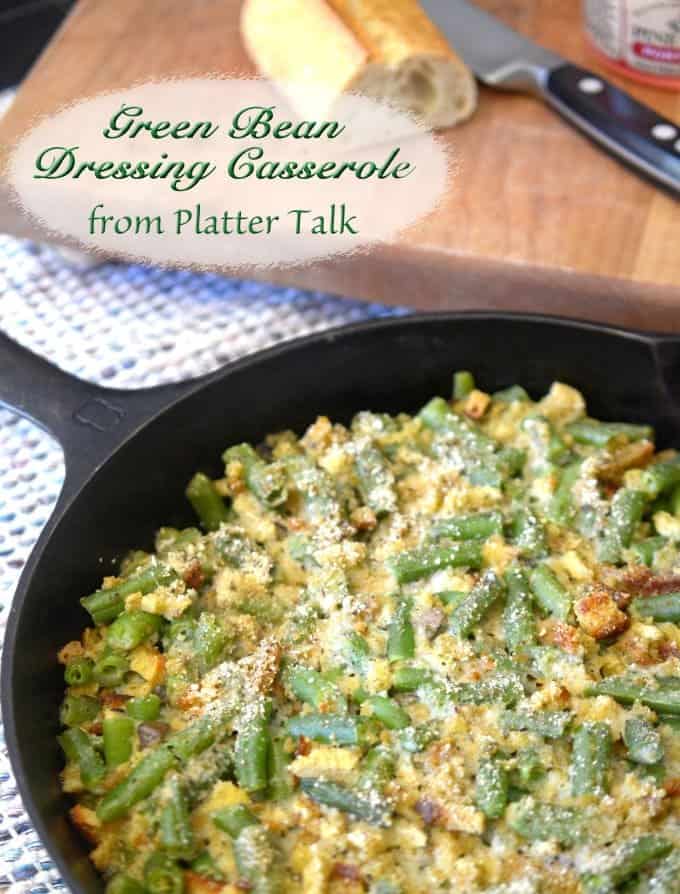 A skillet of food with green beans.