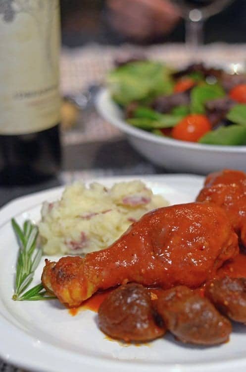 A plate of barbecue chicken.