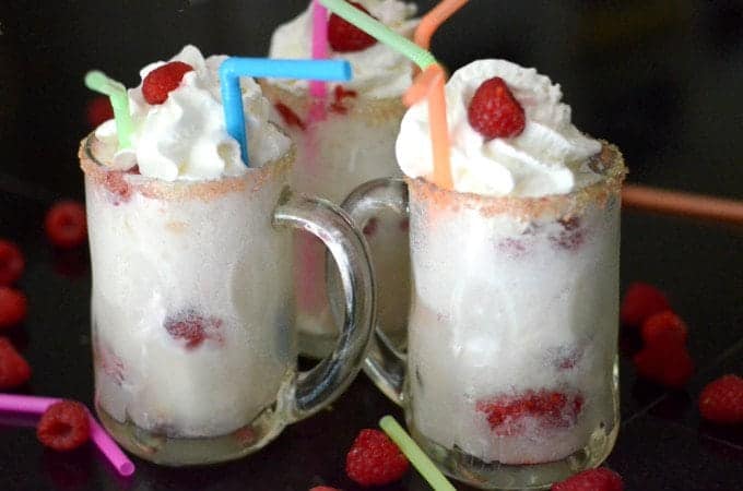 three raspberry ice cream floats.