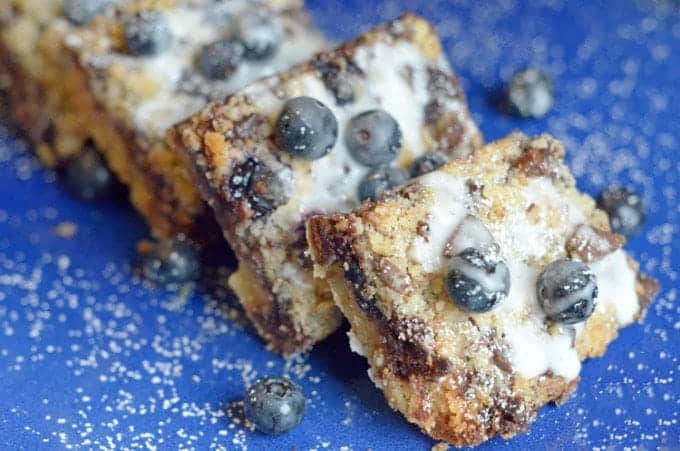 stacked blueberry streusel bars. 