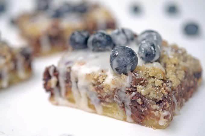 A close up of a blueberry streusel bar.