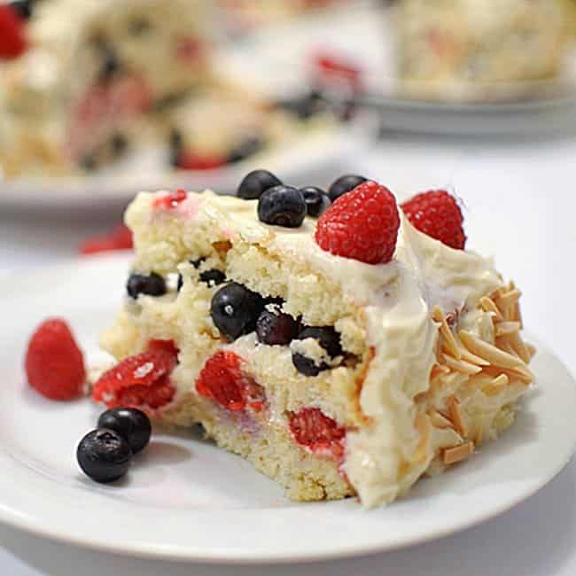 A close up of a slice of cake on a plate.