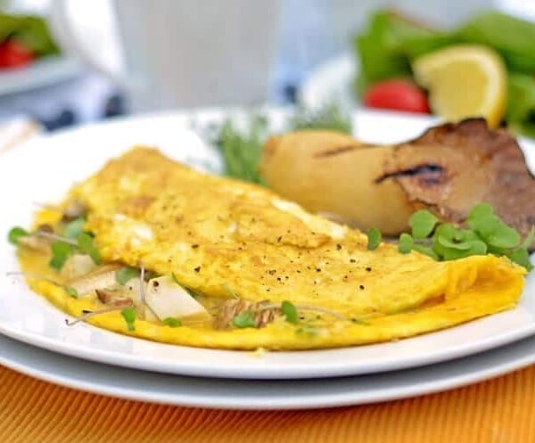 a close up of a mushroom omelet