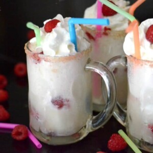 A frosty mug of raspberry ice cream float.