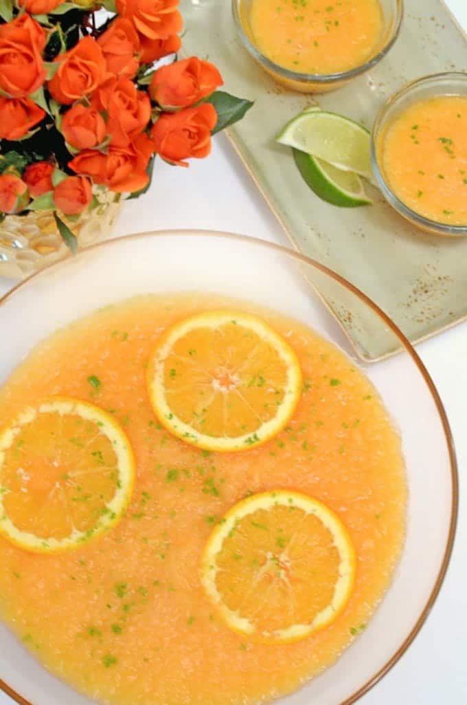 A over head view of a bowl of cantaloupe soup.