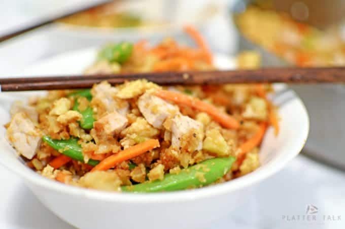 A close up of a plate of Cauliflower fried rice.