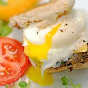 A plate with a black bean breakfast sandwich.