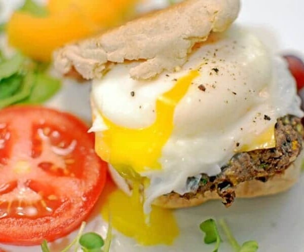 A plate with a black bean breakfast sandwich.