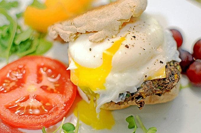 A plate of food a breakfast sandwich.