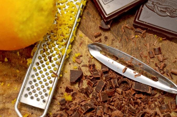 A cutting board with chocolate on it.