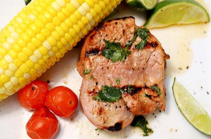 A plate of food, with Pork tenderloin