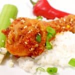 fried chicken on a bed of rice.