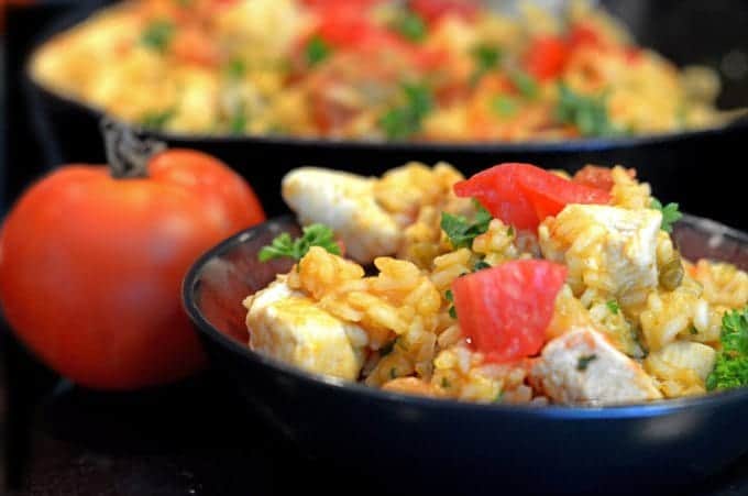 A bowl of Jambalaya and Chicken breast