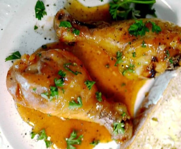 A close up of food on a plate, with Chicken and Honey