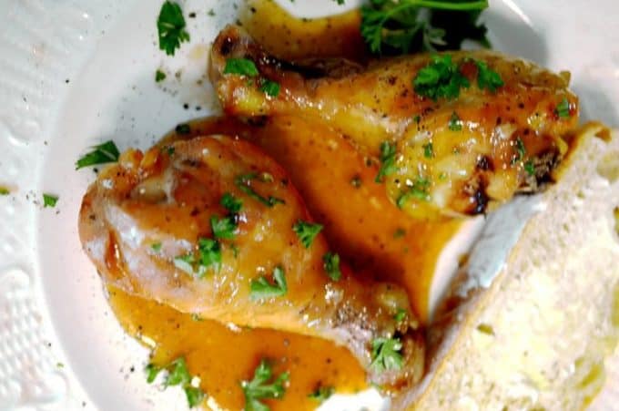 A close up of food on a plate, with Chicken and Soy sauce