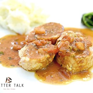 A plate of food, with Apple butter and Herbs