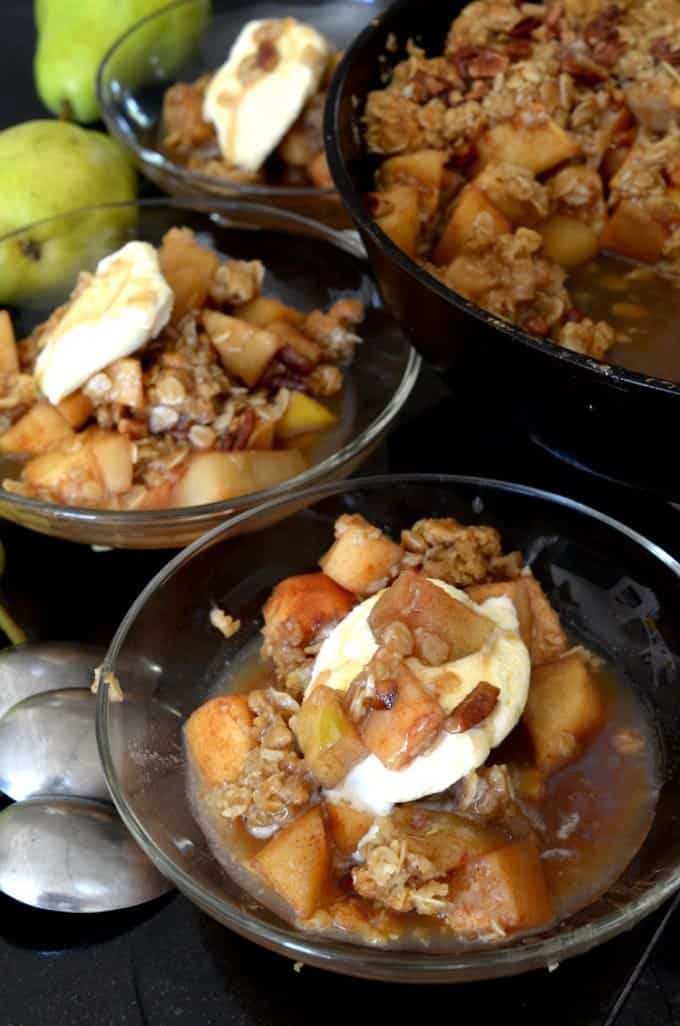 a bowl full of fruit crisp