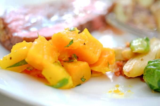 A close up of food on a plate, with Squash and Garlic