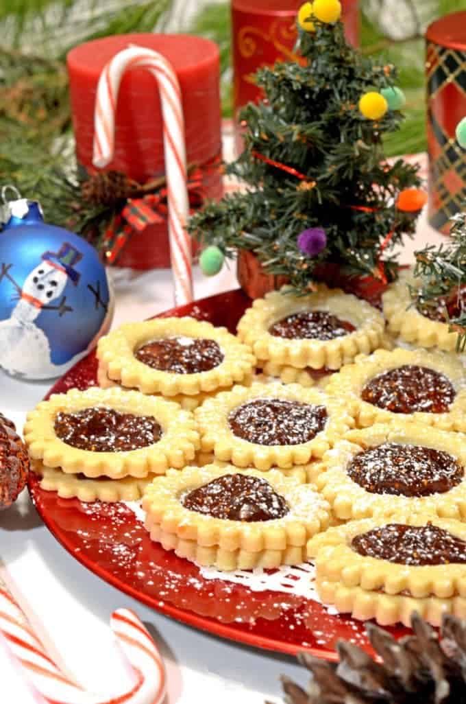 A bunch of spitzbuben cookies on a tray