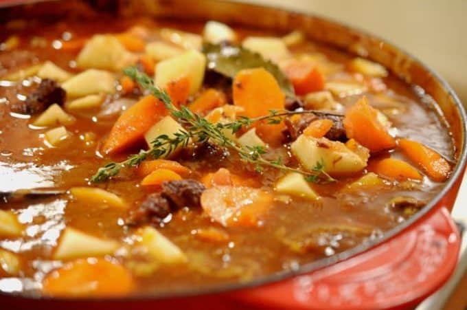 A close up of a bowl of food, with Stew