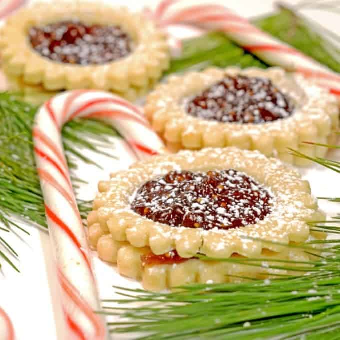 Some cookies with pine needles and candy canes