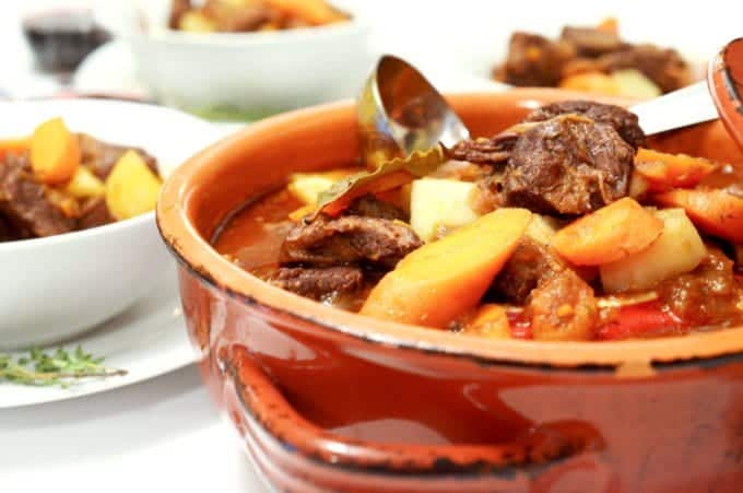 A bowl of stew with beef