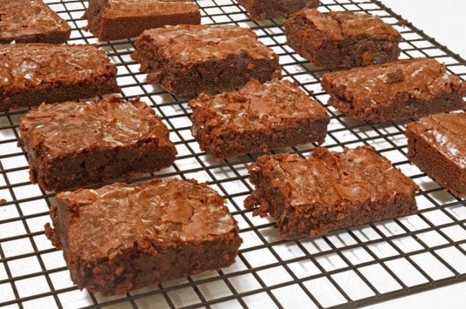 A bunch of brownies on a cooling rack