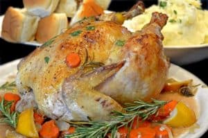 A plate full of food, with Roast chicken