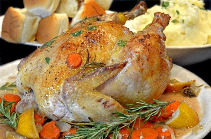 A roasted chicken with rosemary