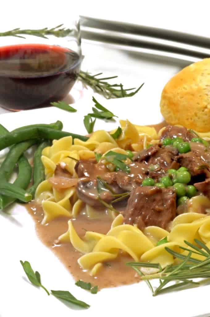 A plate of beef and noodles