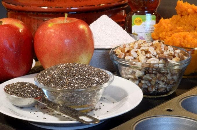 a bowl of chia seeds on a plate.