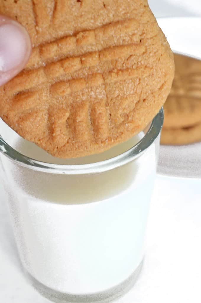 You're going to love dunking these 3 Ingredient Old Fashioned Peanut Butter Cookies in a tall glass of cold milk!