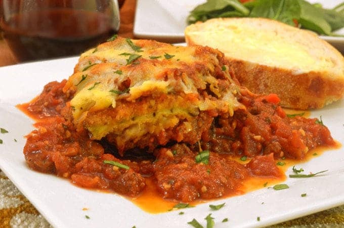 A close up of a plate of food, with Eggplant