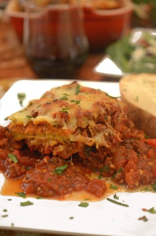 A serving of eggplant parmesan and bread