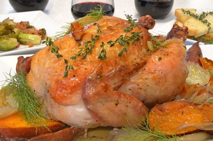 A plate of food with meat and vegetables, with Roast chicken