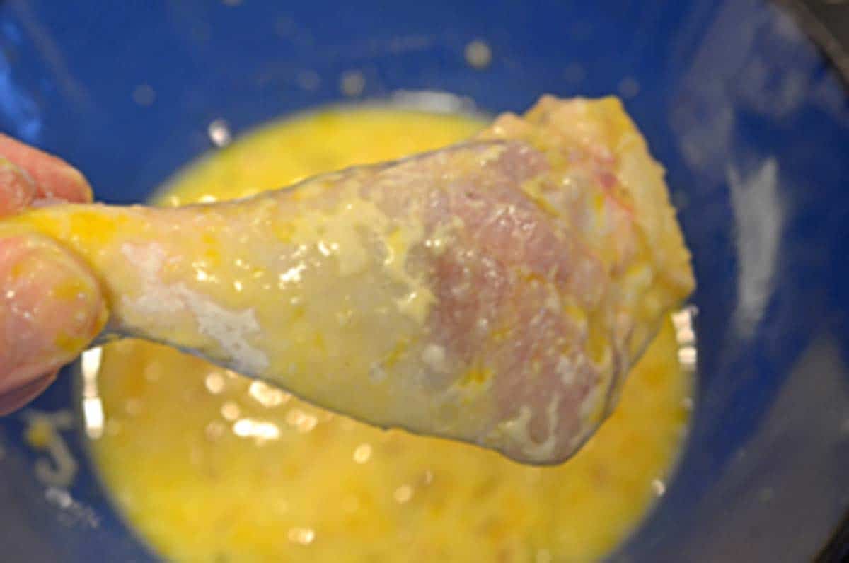Dredging chicken in egg.
