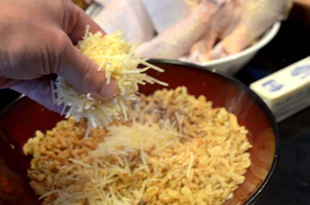 Some Parmesan cheese in a dredging bowl.