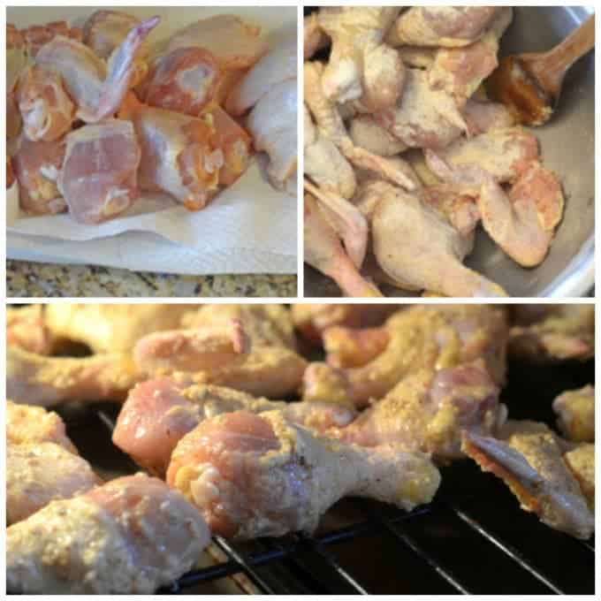 An oven rack of chicken wings baking